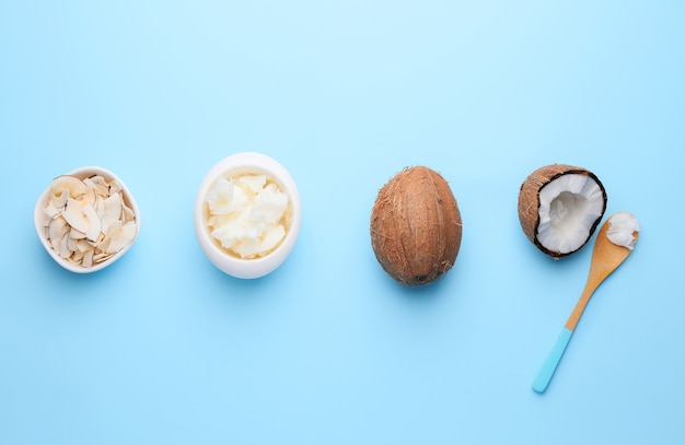 Photo composition with different coconut products on color