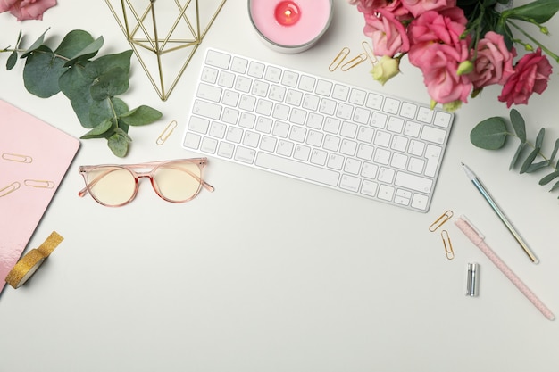 Composition with female accessories on white. Woman blogger