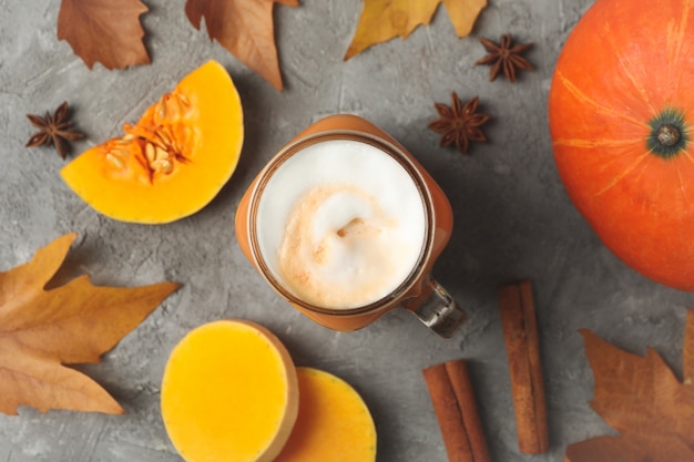 Composition with pumpkin latte pumpkin leaves and cinnamon