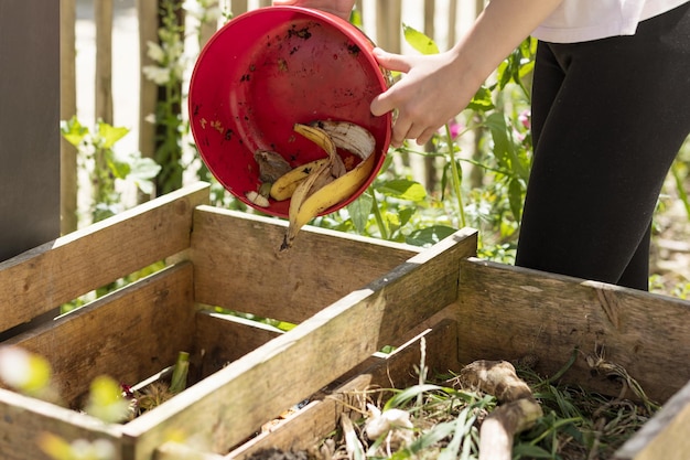 Compost Organic Waste throwing in Compost Bin. Recycling Eco Fertilizer, Sorting Waste, Bio Humus