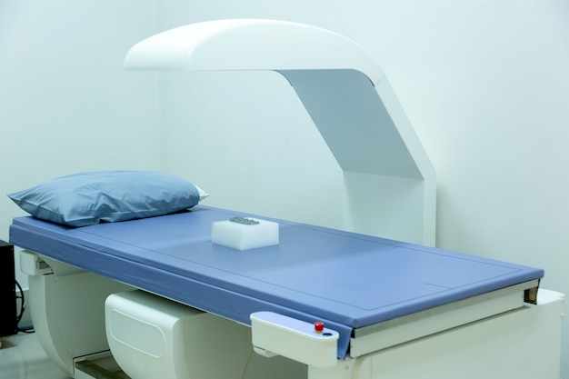 Computed tomography or computed axial tomography scan machine in hospital room.