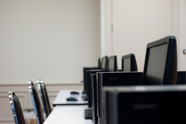 Computer lined up in computer classroom