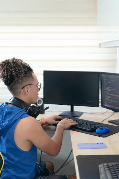 Computer Programmer Working In His Studio