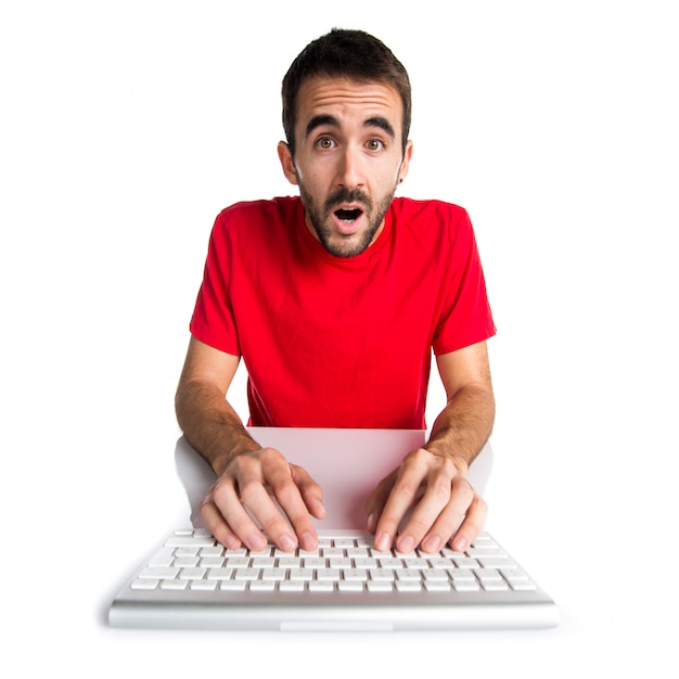 Computer technician working with his keyboard