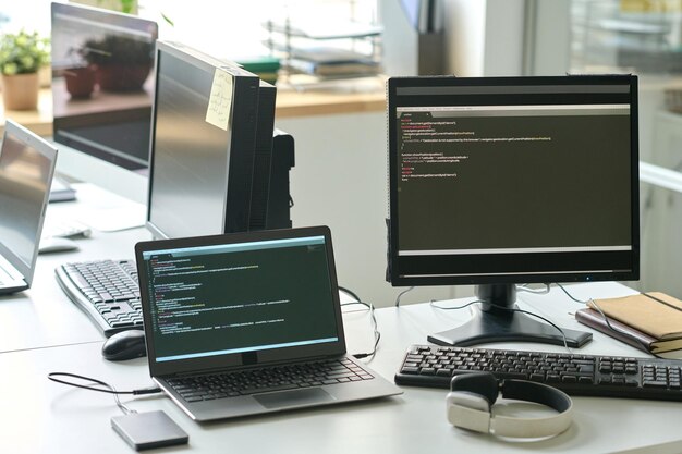 Computers with software on table