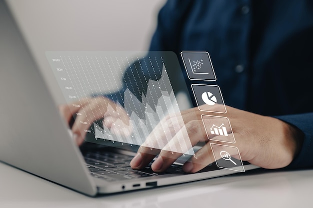 The concept of analytics for large amounts of data and business intelligence Financial charts are displayed on a screen that is simulated