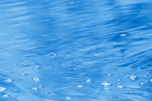 concept blue abstract background water / ocean, lake waves on water, reflection of ripples on the river