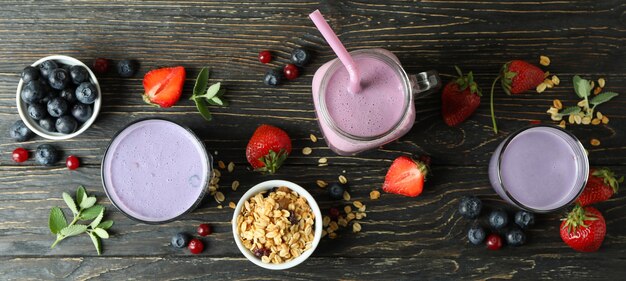 Concept of breakfast with smoothie on rustic wooden table