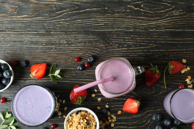 Concept of breakfast with smoothie on rustic wooden table