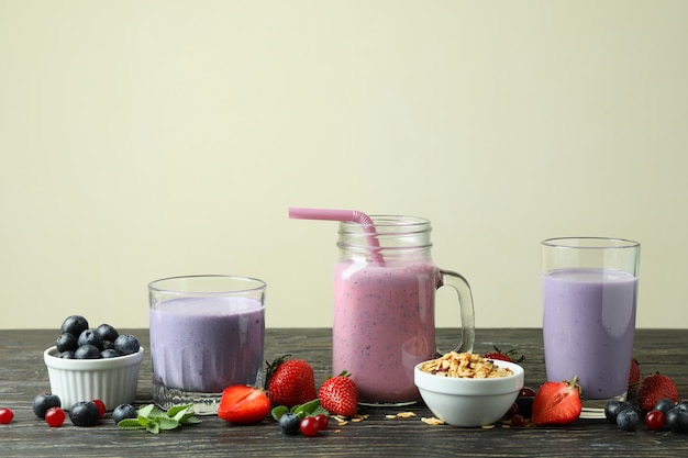 Concept of breakfast with smoothie on rustic wooden table