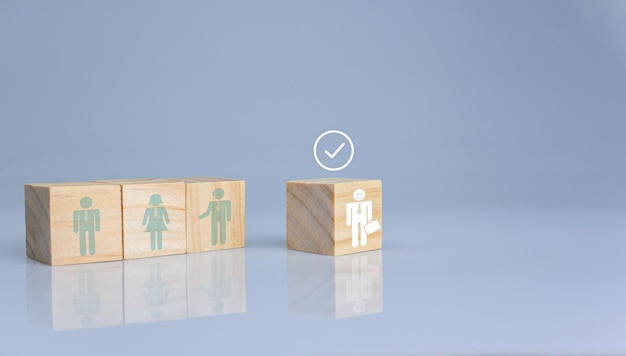 Concept of Business and HR for leadership and team leader One cube wood block out in front Different