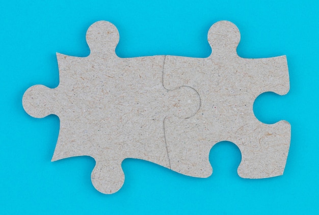 Photo concept of business teamwork and integration with puzzle.