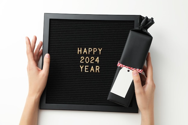 The concept of celebrating the New Year black card 2024