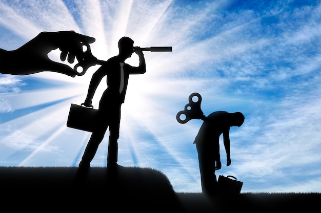 The concept of competition and new ideas in business. Silhouette of a worker looking through a telescope with a clockwork mechanism at the back and the tired working competitor