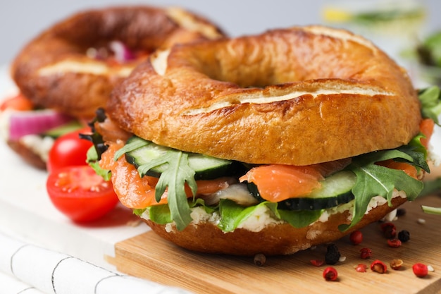 Concept of delicious food tasty bagel sandwich