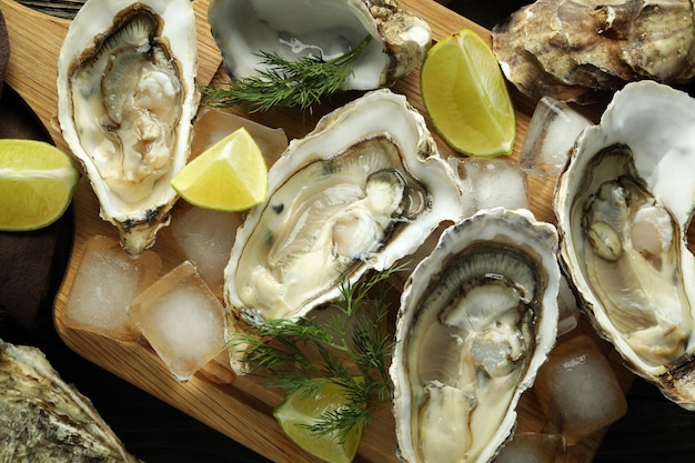 Concept of delicious seafood oysters close up