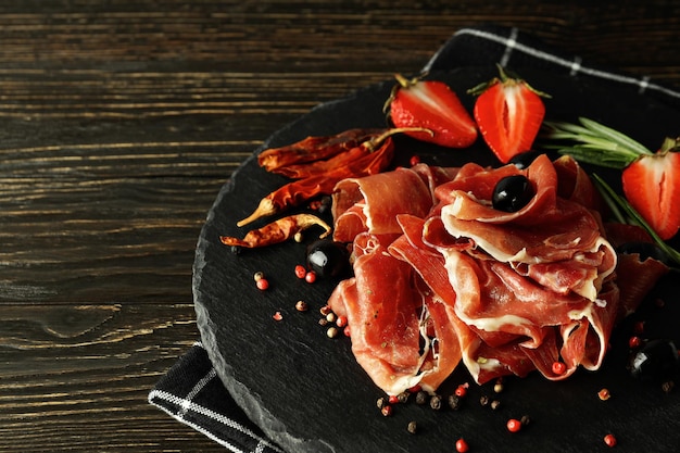 Concept of delicious Spanish cuisine jamon space for text