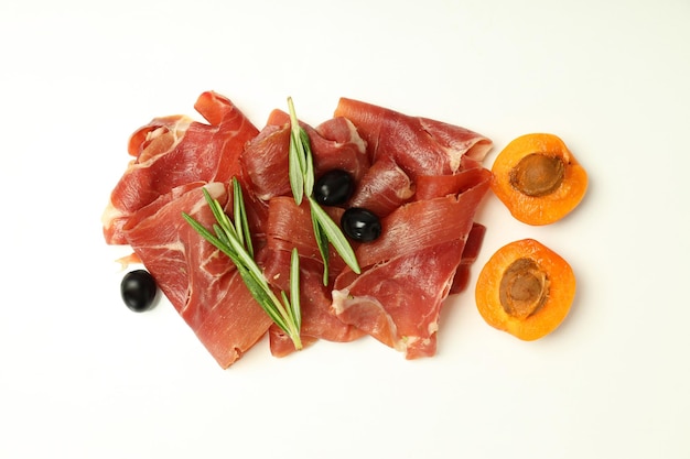 Concept of delicious Spanish cuisine jamon on white background