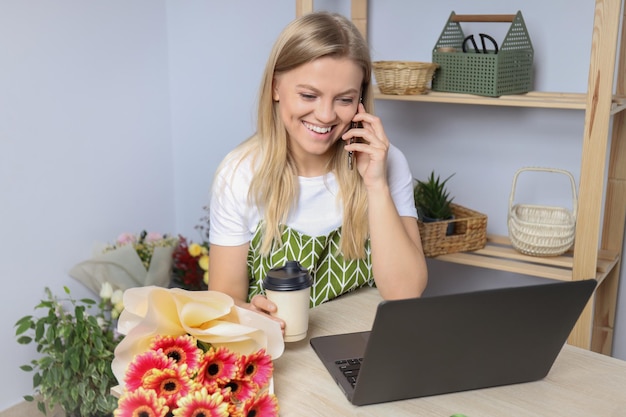 Concept of floral shop delivery and florist with young woman