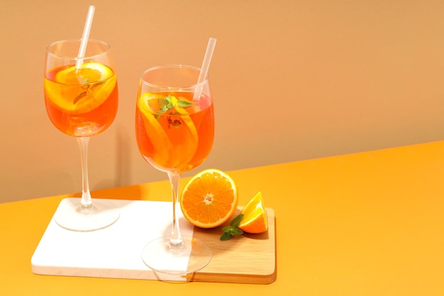 Concept of fresh alcohol drink Aperol Spritz space for text