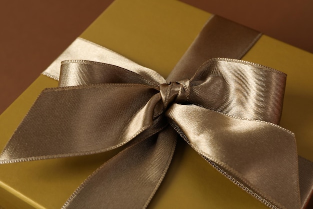 Concept of gift gift box on brown background