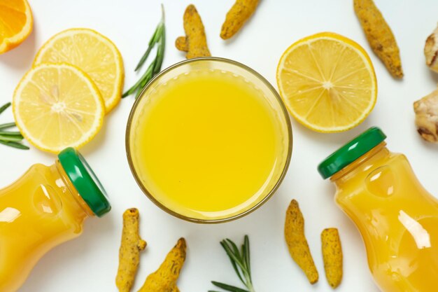 Concept of healthy liquid ginger turmeric drink