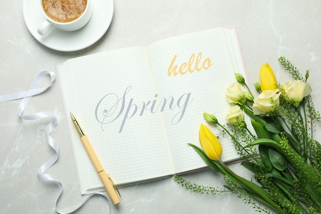 Concept of "Hello Spring" on light textured background