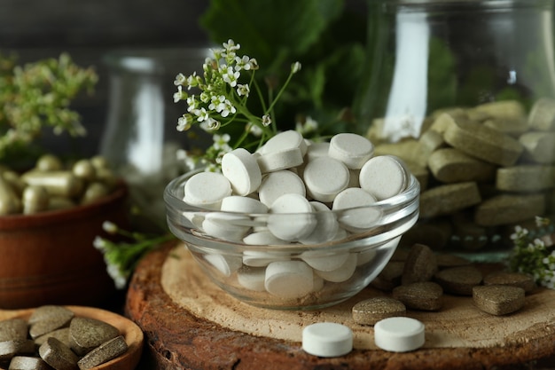 Concept of herbal medicine pills, close up