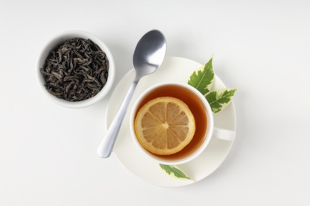 Concept of hot drink with tea on white background