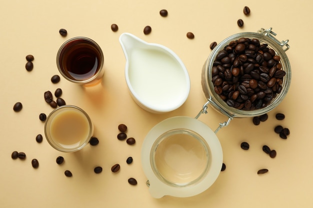 Concept of making Irish coffee on beige background