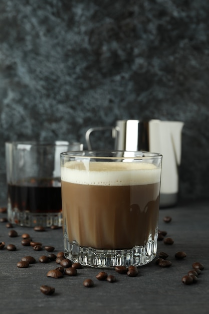 Concept of making Irish coffee on dark wooden table