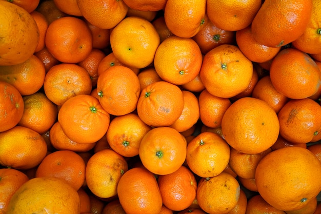 Concept of natural products and healthy eating. Orange mandarines in box,  background.