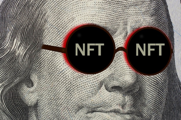 Concept of nonfungible NFT tokens Closeup portrait of Franklin with glasses