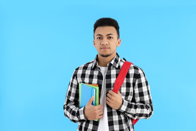 Concept of people with young man on blue background