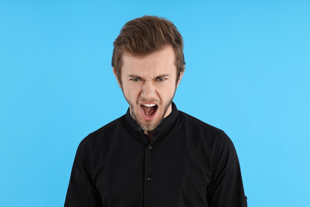 Concept of people young man on blue background