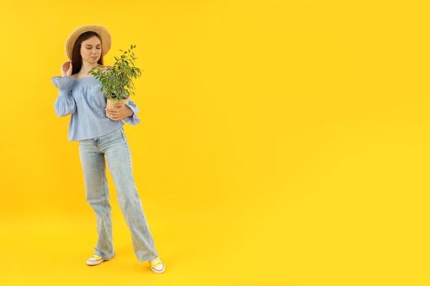 Concept of people young woman on yellow background