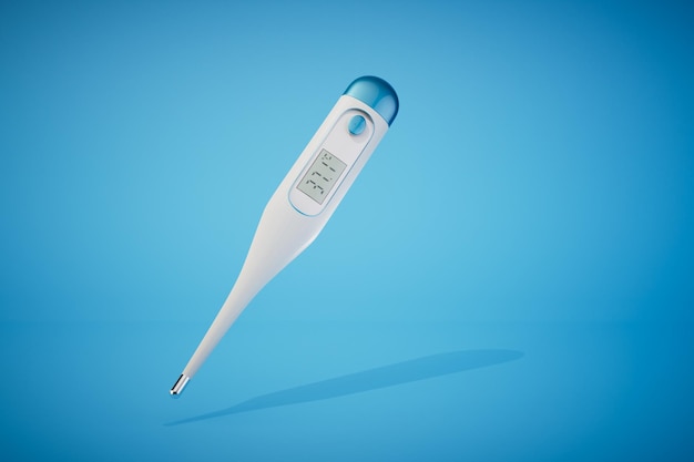 The concept of primary diagnosis of the disease electronic thermometer on a blue background