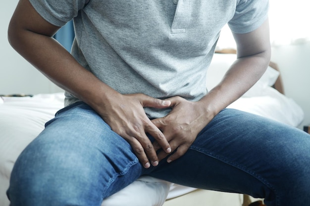 The concept of prostate and bladder problem crotch pain of a young person