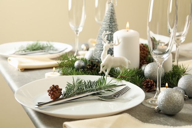 Concept of romantic New year table setting on gray table