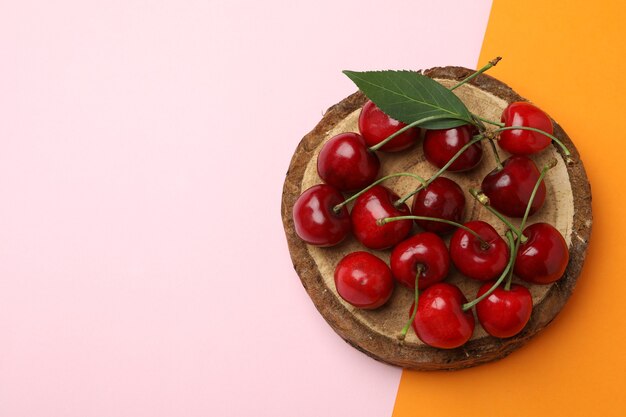 Concept of sweet berry with red cherry