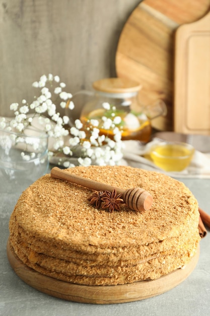 Concept of tasty dessert with honey cake close up