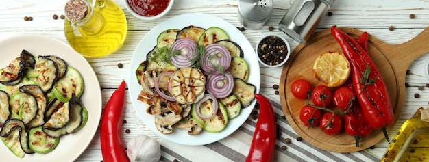 Concept of tasty eating with grilled vegetables, top view