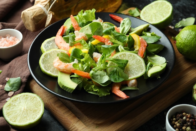 Concept of tasty eating with shrimp salad, close up