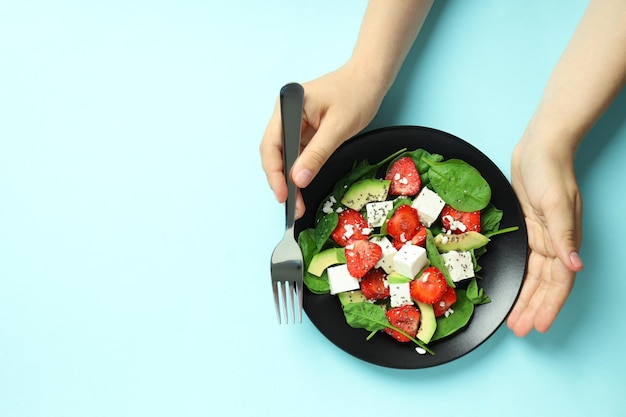 Concept of tasty food salad with strawberry space for text