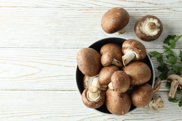 Concept of tasty food with champignon on white