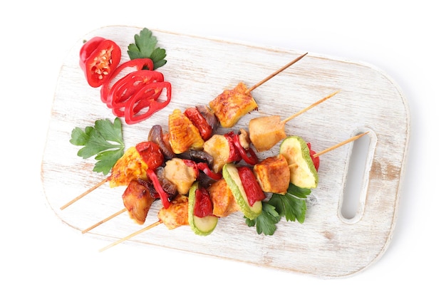 Concept of tasty food with chicken shashlik isolated on white background