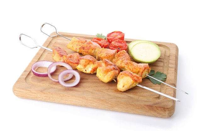 Concept of tasty food with chicken shashlik isolated on white background