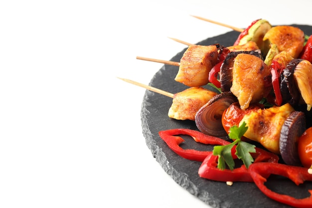 Concept of tasty food with chicken shashlik on white background