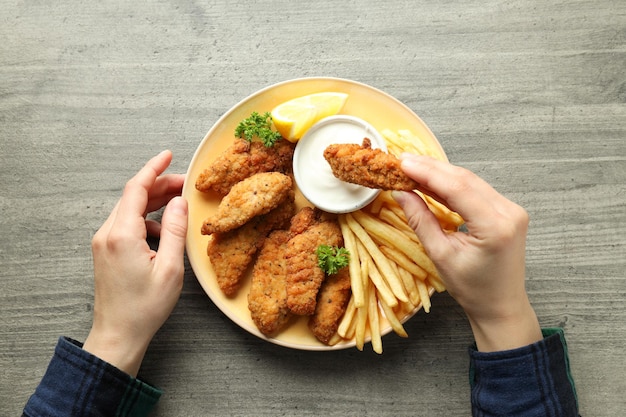 Concept of tasty food with chicken strips top view