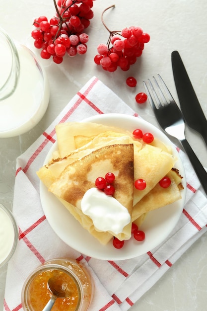 Concept of tasty food with crepes, top view